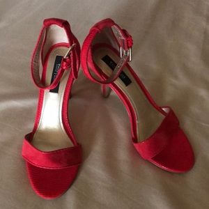 Stunning red heels with ankle strap